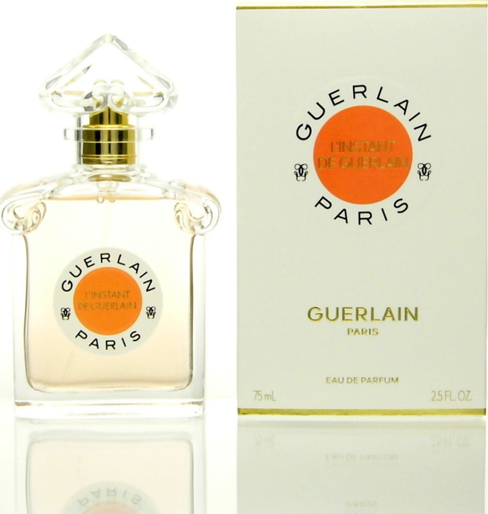 A perfume bottle and its packaging are displayed against a white background.