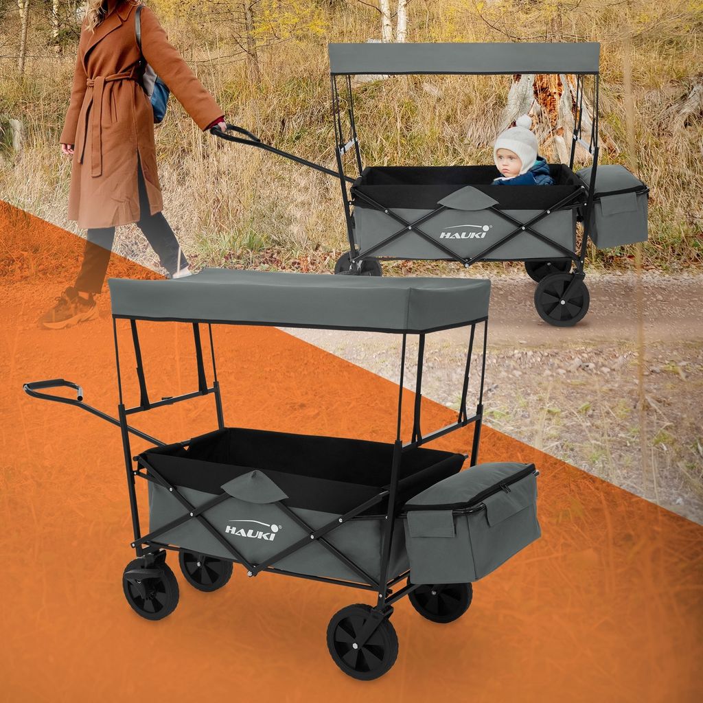 A woman is pulling a wagon with a baby in it on a dirt path.