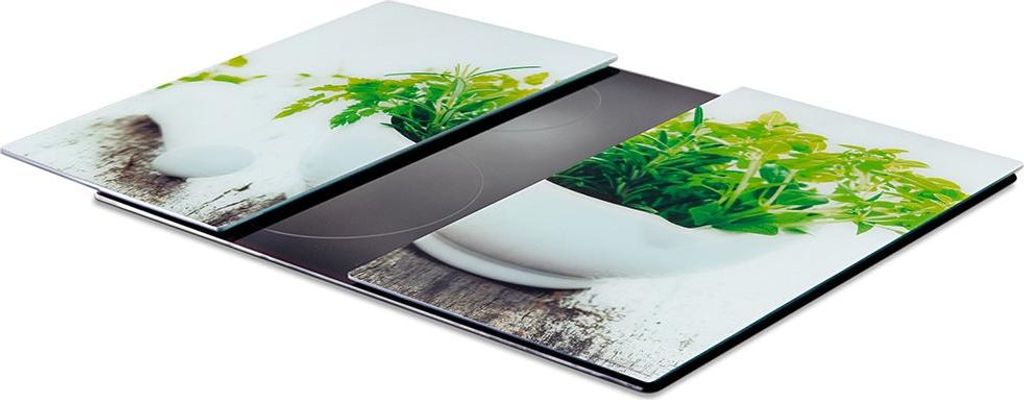 A set of two glass cutting boards with a nature-themed print, placed on a dark surface.