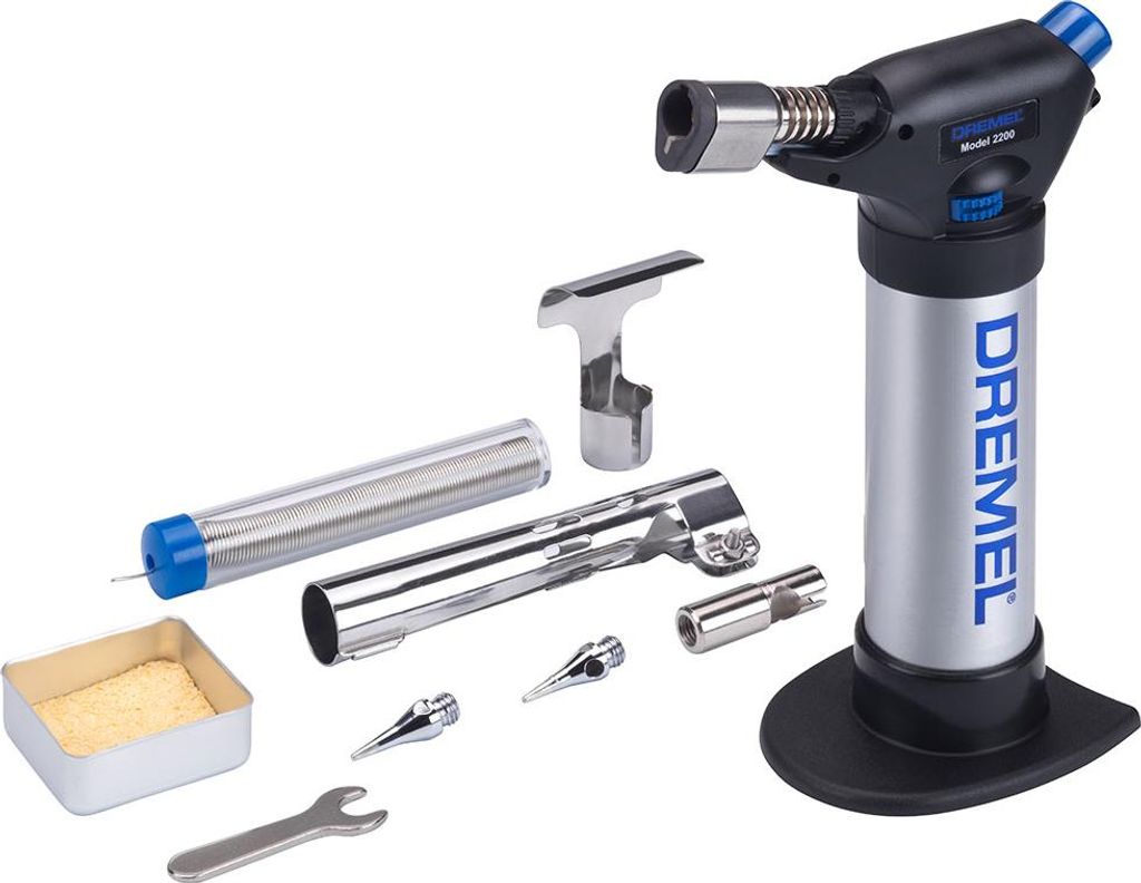 A Dremel VersaFlame butane torch and its accessories are laid out on a white background.