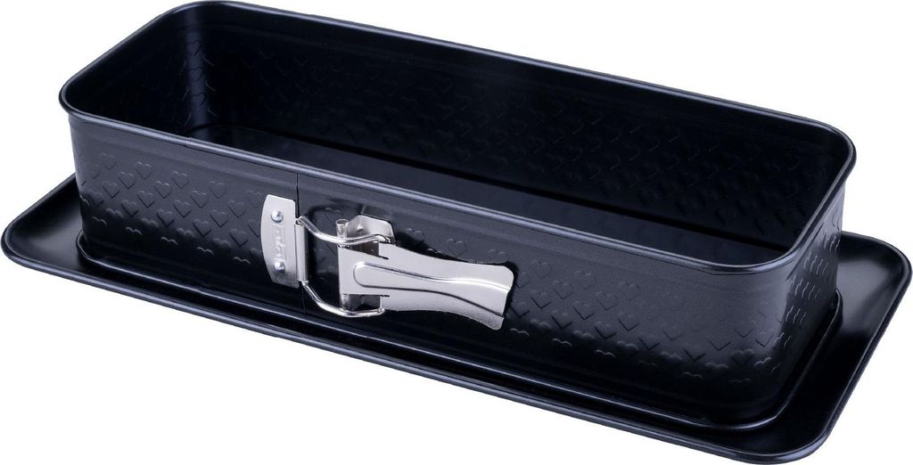 A black rectangular baking pan with a silver clasp sits on a black rectangular tray.