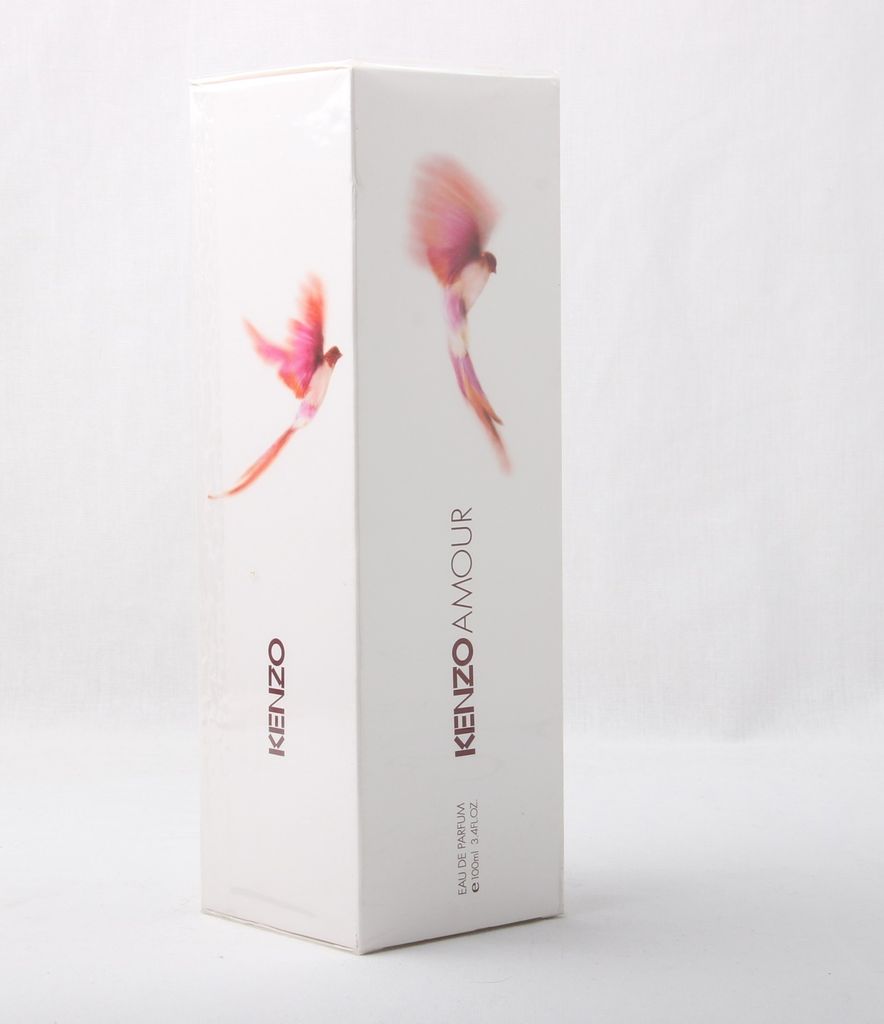 A white box of Kenzo Amour perfume with pink bird illustrations.