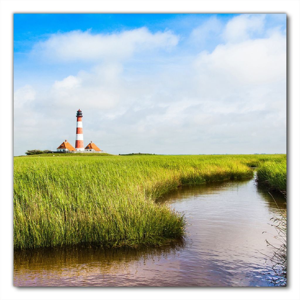 Wallario selbstklebende Möbelfolie/ Tischdecke für Innen und Außen, Größe: 100 x 100 cm - Kleiner Bach durch Schilf auf dem Weg zum Leuchtturm