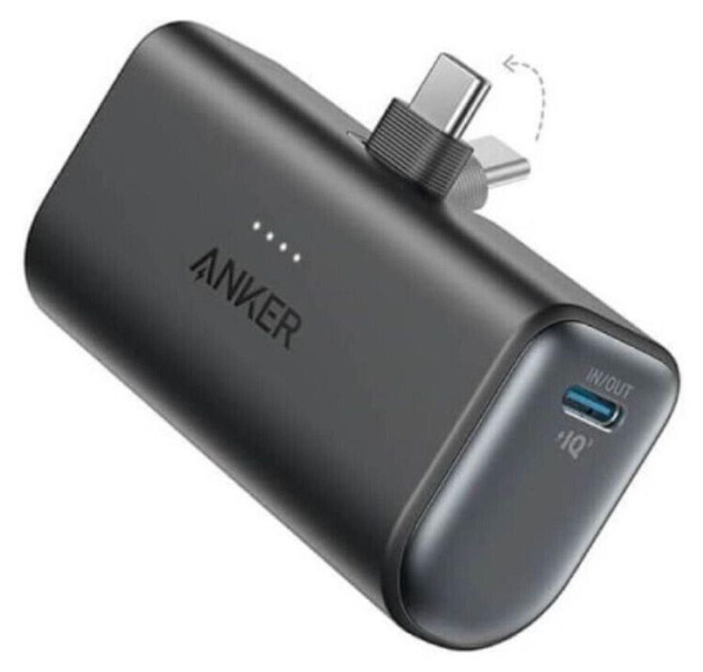 A black Anker Nano power bank with USB-C connectors is shown against a white background.