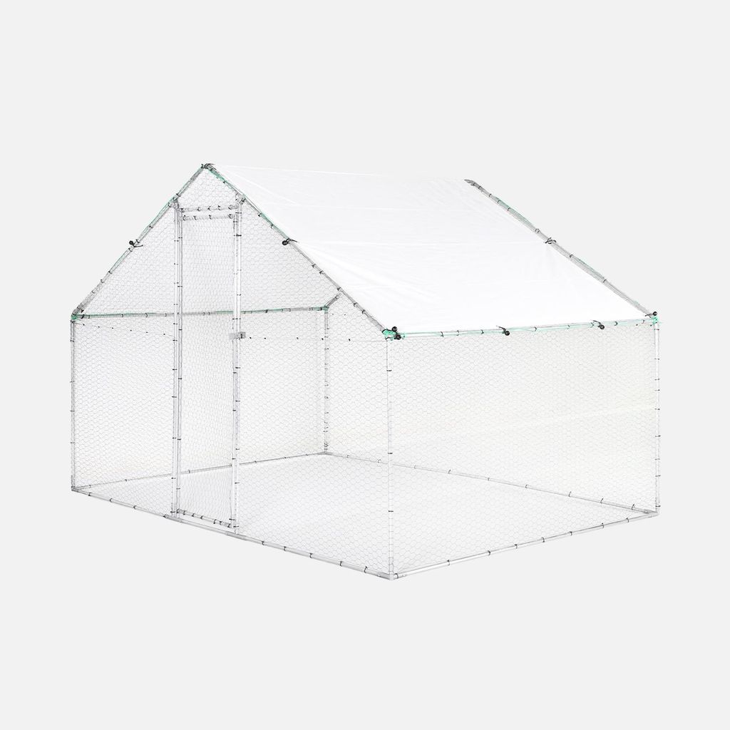 A white chicken coop with a green frame, set against a light gray background.