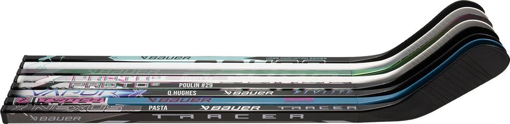 A stack of hockey sticks with different colored blades and shafts, all facing the same direction.
