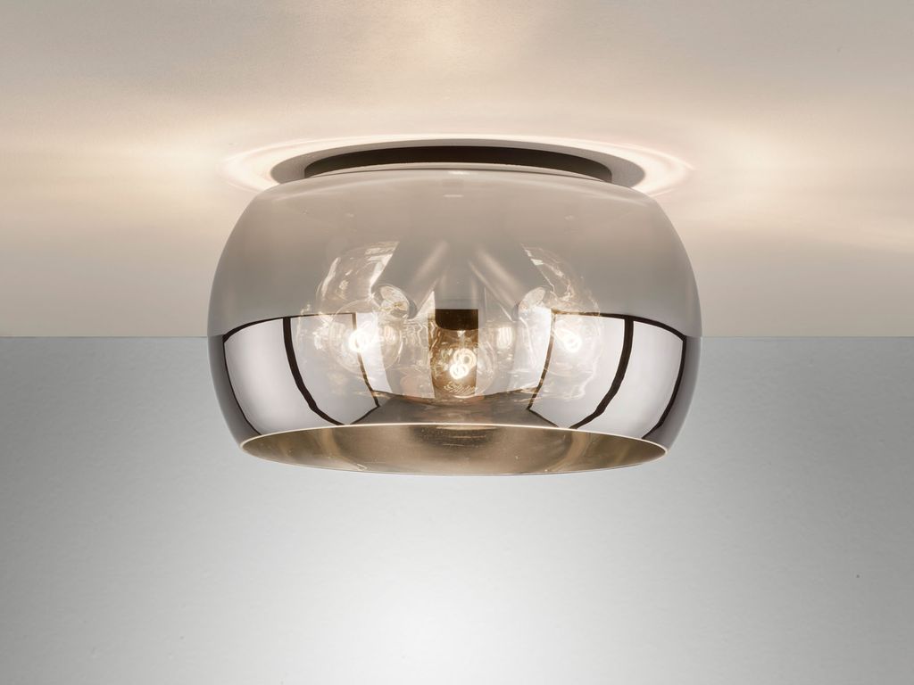 A close-up shot of a modern ceiling light fixture.