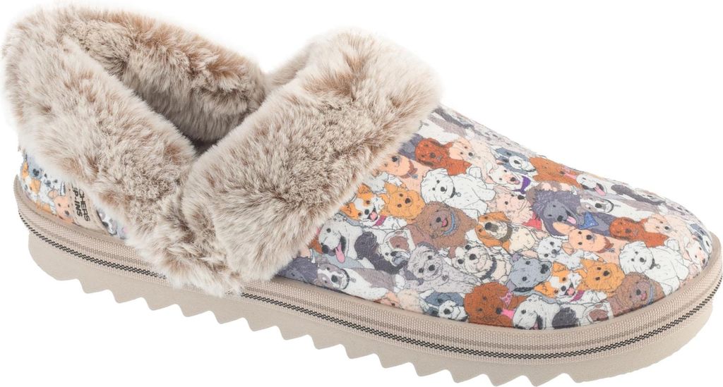 A single slipper with a dog print pattern and faux fur trim is shown against a white background.