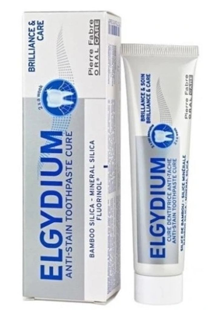 A box of Elgydium toothpaste and a tube of Elgydium toothpaste are shown side-by-side against a white background.