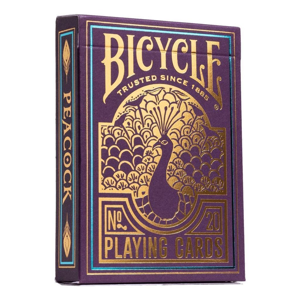 A close-up studio shot of a Bicycle brand playing card deck with a peacock design.