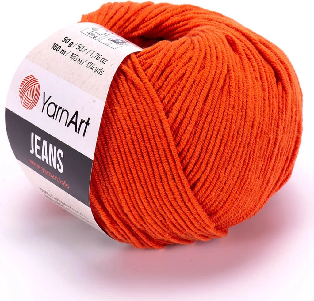 A ball of orange yarn with a label.