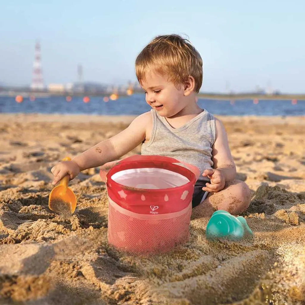 Set de jeu de plage Hape pour vacances - Kit de sable compact voyage
