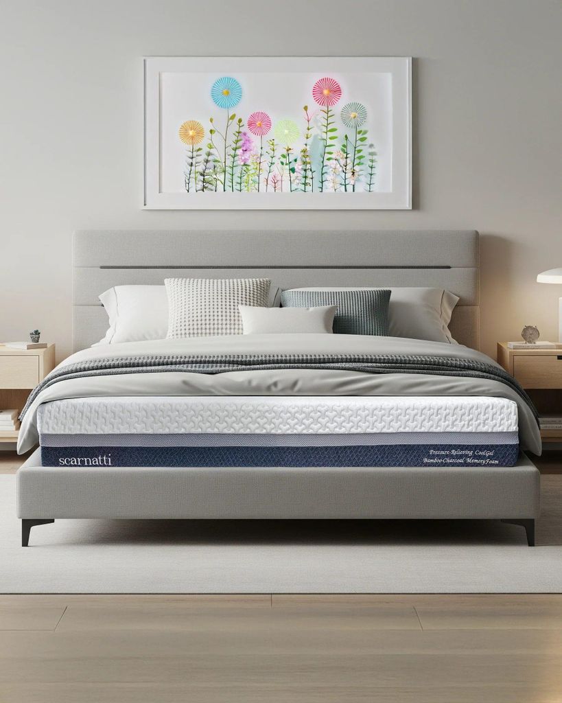 A bedroom scene with a bed and mattress.