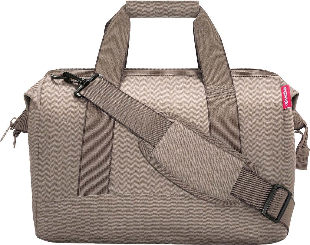 A studio shot of a duffel bag.