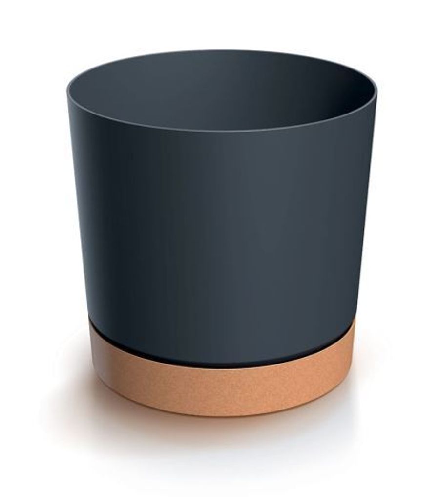 A dark gray cylindrical pot with a brown base sits on a white surface.