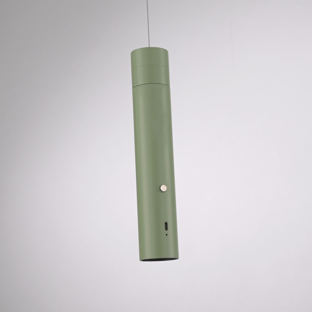 A green LED pendant light hangs from a thin wire against a plain background.