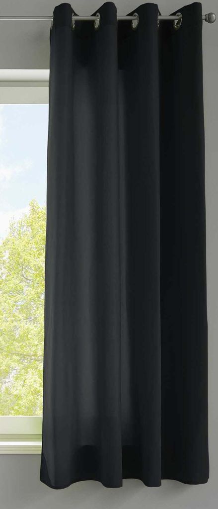 A black curtain hanging in front of a window.