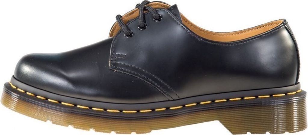 A side view of a black Dr. Martens shoe.