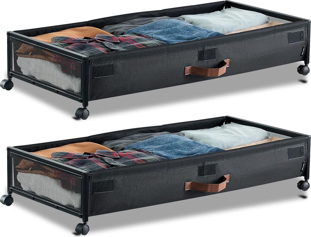Two under-bed storage containers filled with folded clothes are shown side-by-side against a white background.