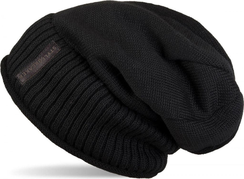 A black beanie hat is shown from a diagonal angle.