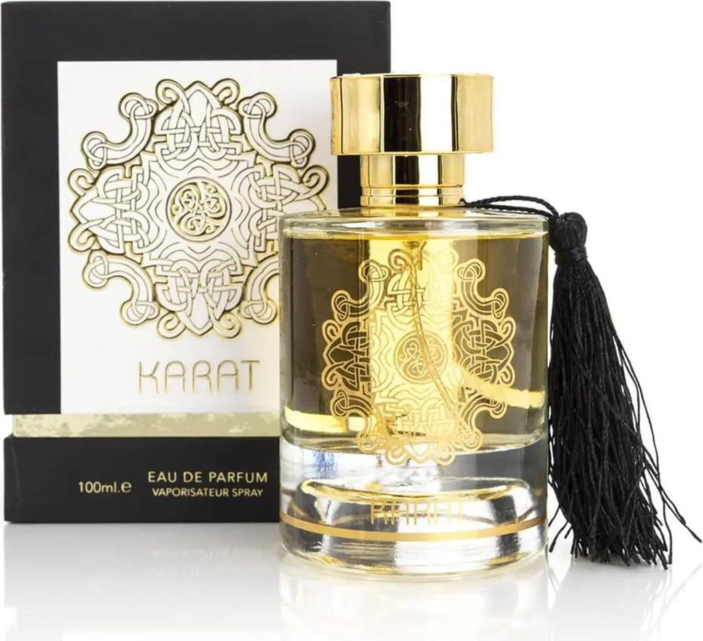 A perfume bottle and its packaging are displayed against a white background.