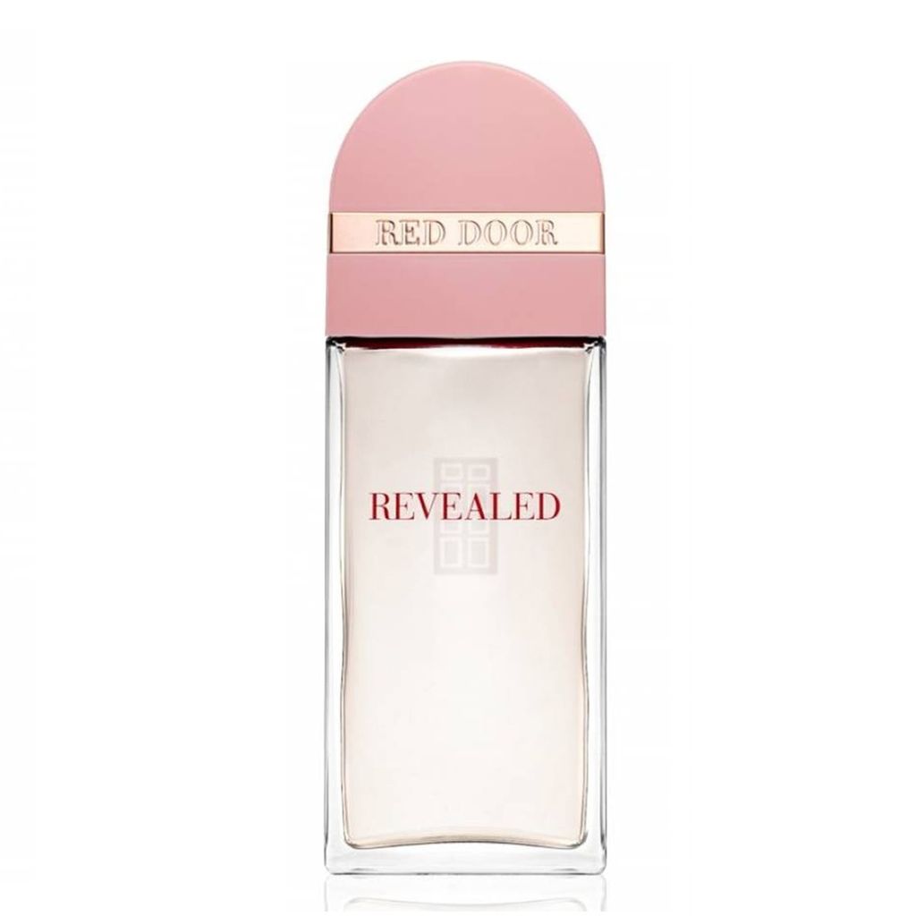 A perfume bottle with a pink cap and a clear glass body.