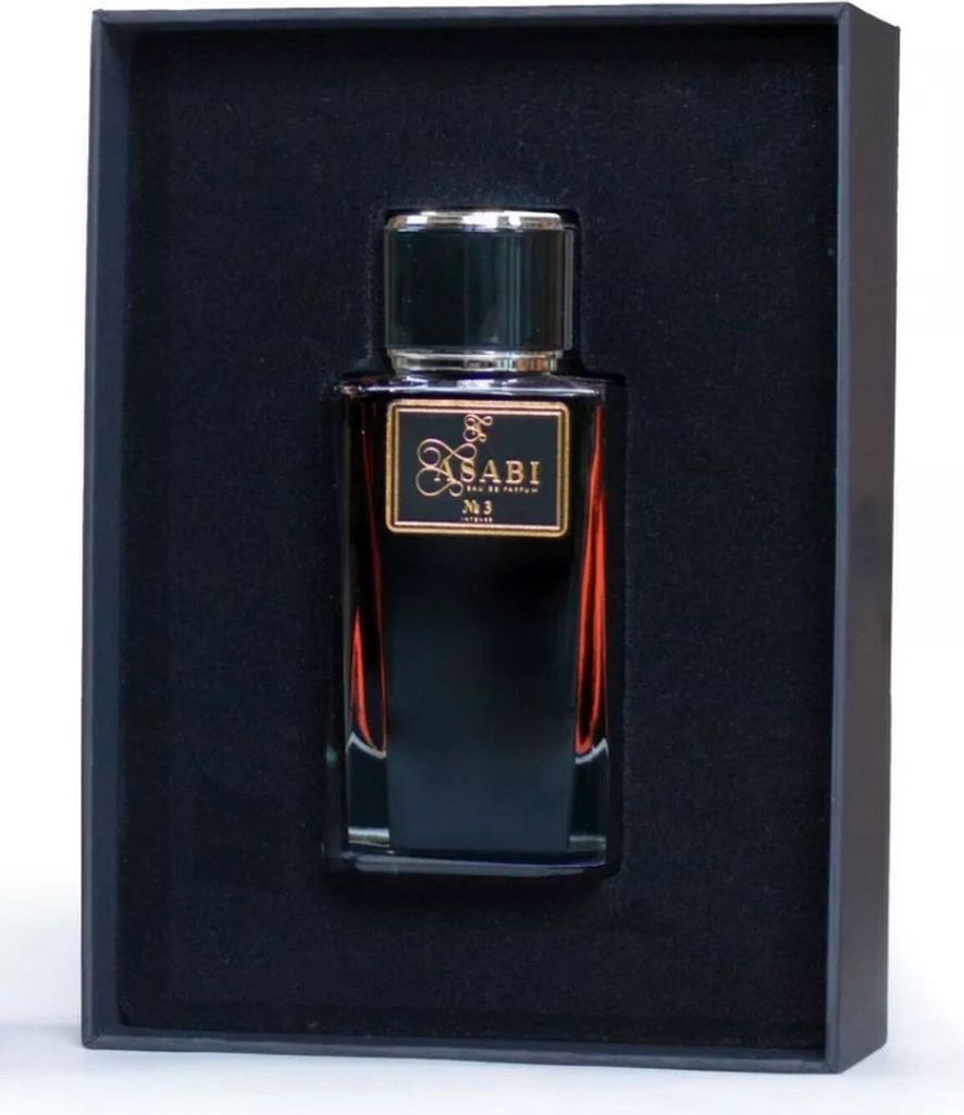 A bottle of perfume is presented in a black box.