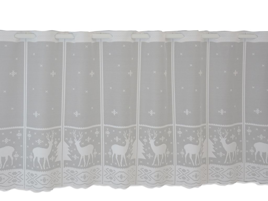A white lace curtain with a deer and snowflake pattern.