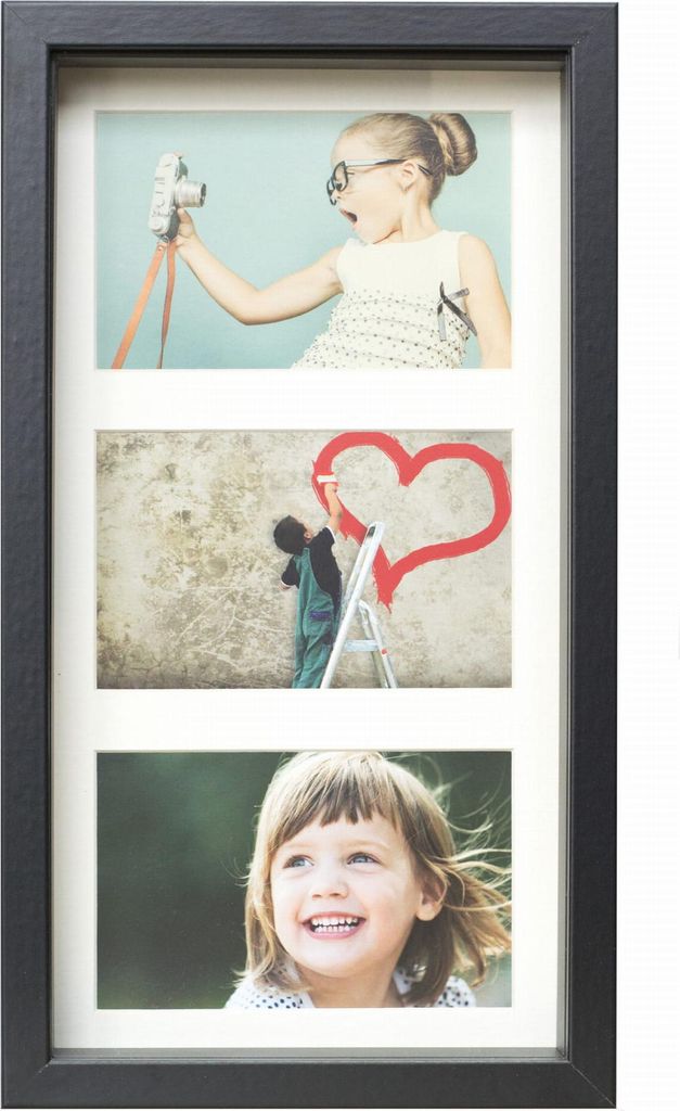 A black multi-photo frame with a white mat and three inserted photos. The top photo shows a young girl taking a selfie with a vintage camera. The middle photo shows a person painting a red heart on a wall. The bottom photo is a close-up of a smiling young 