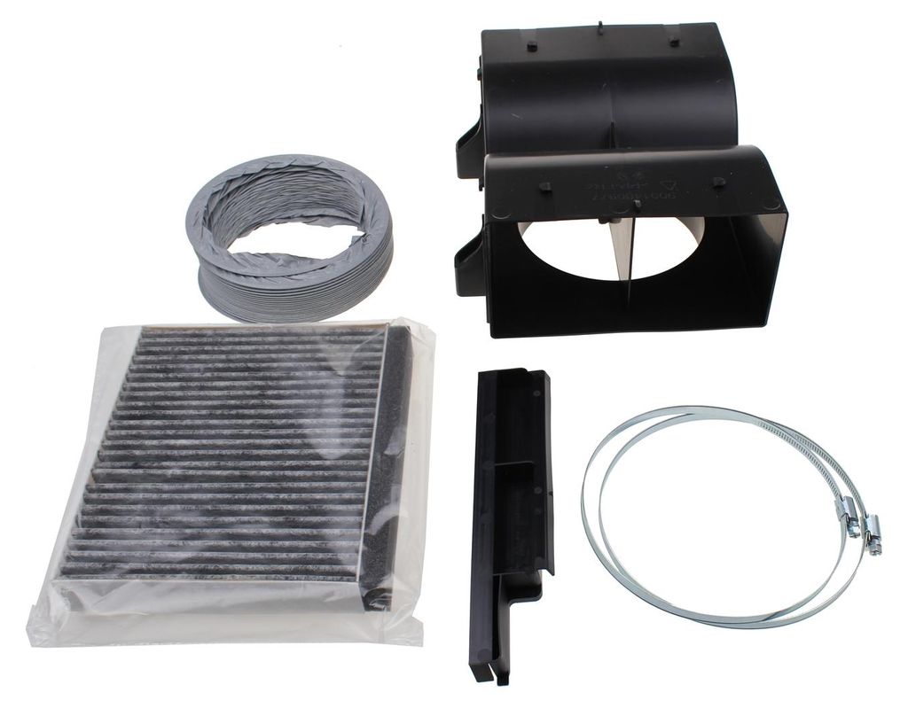 A collection of car air conditioning parts laid out on a white background.