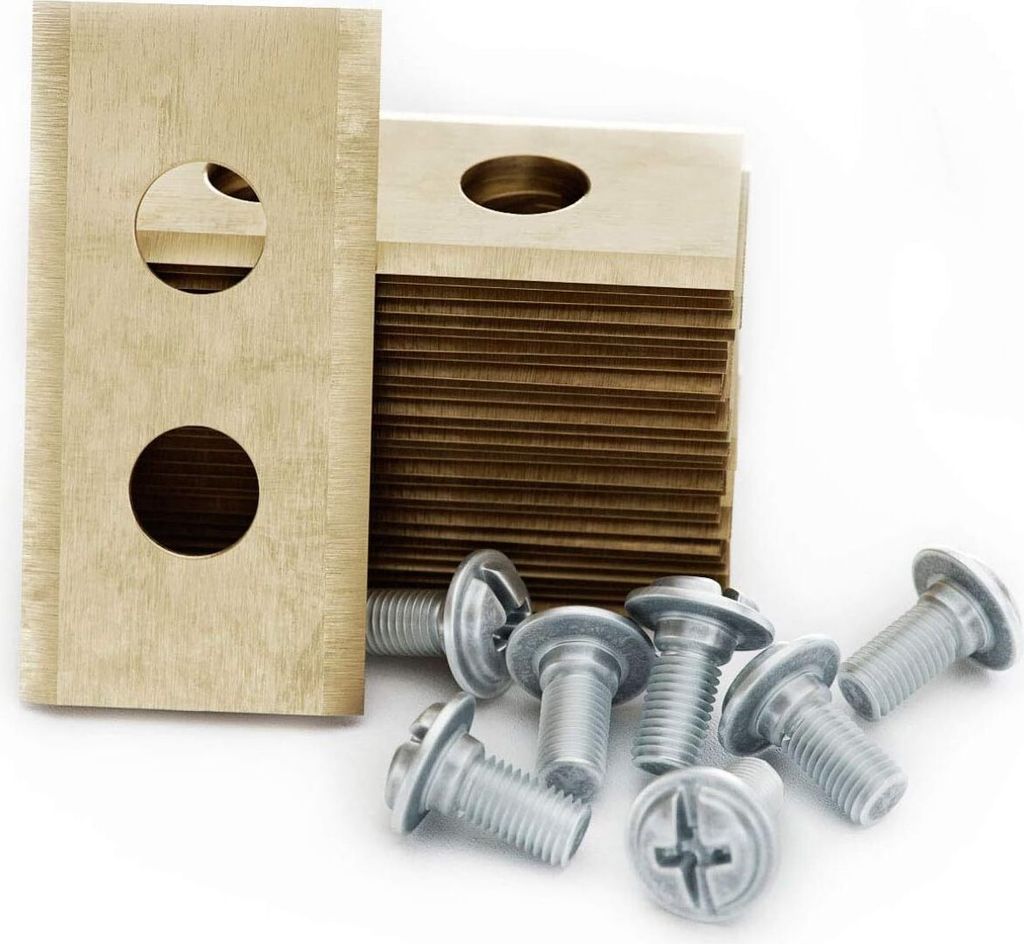 A stack of replacement blades for a robotic lawnmower and several screws are arranged on a white background.