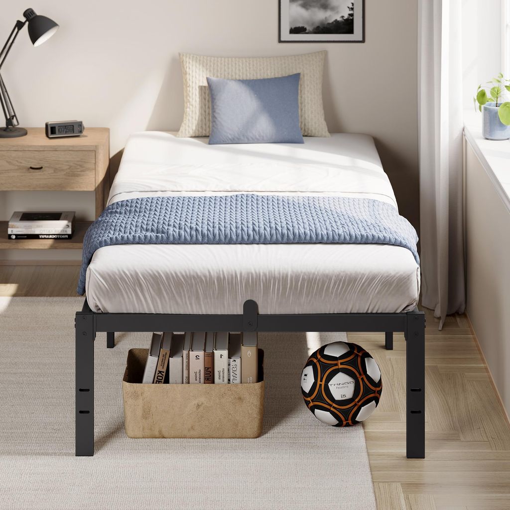 A bedroom scene with a single bed, nightstand, and window.