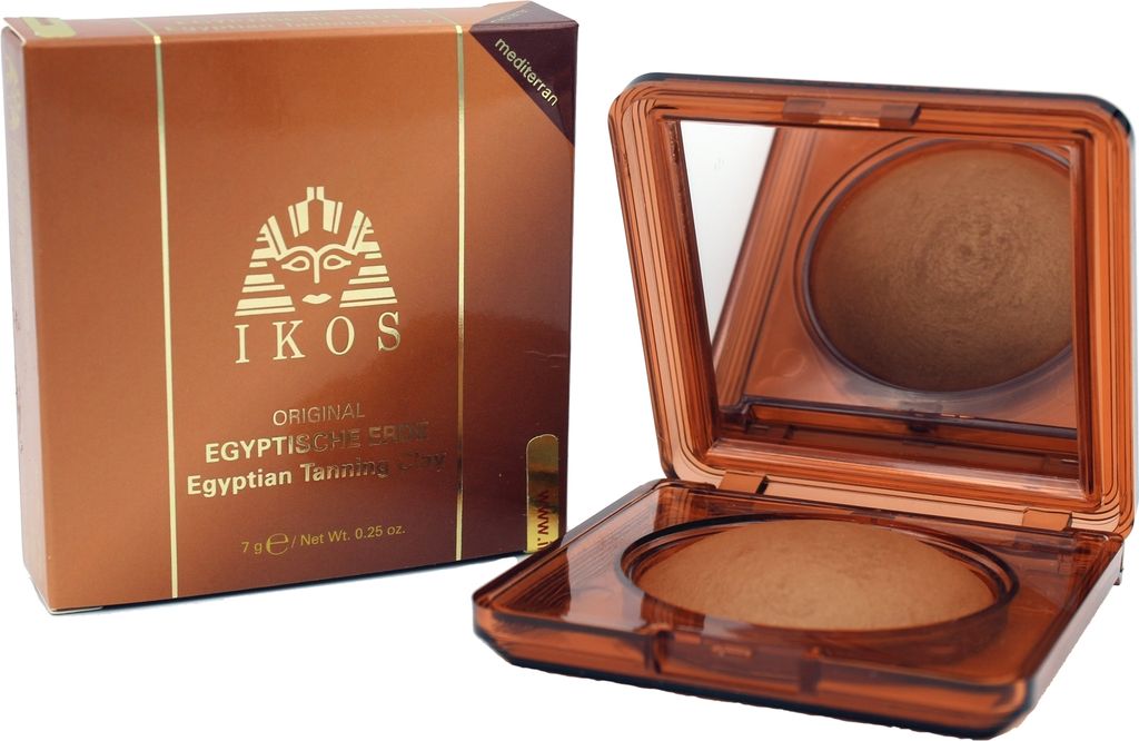 A box of IKOS Teint - Egyptische Erde and an open compact of the bronzer with a mirror.