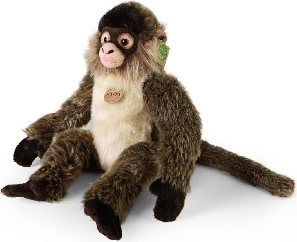 A plush toy monkey sitting on a white background.