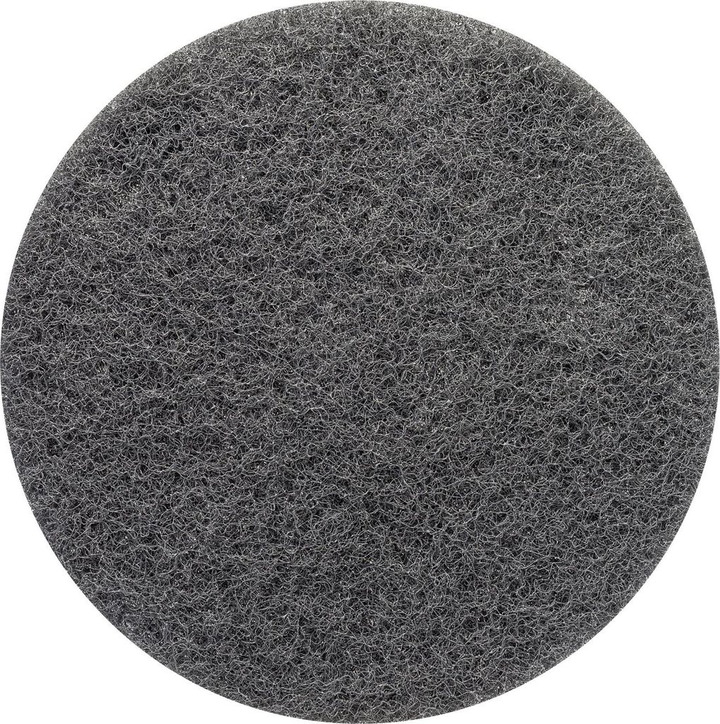A close-up, top-down view of a circular gray abrasive pad.