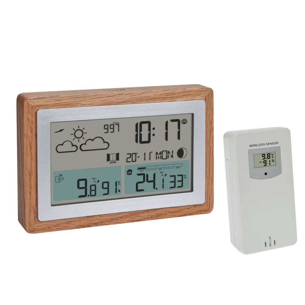 A digital weather station with a wooden frame and a separate wireless sensor, displayed on a white background.