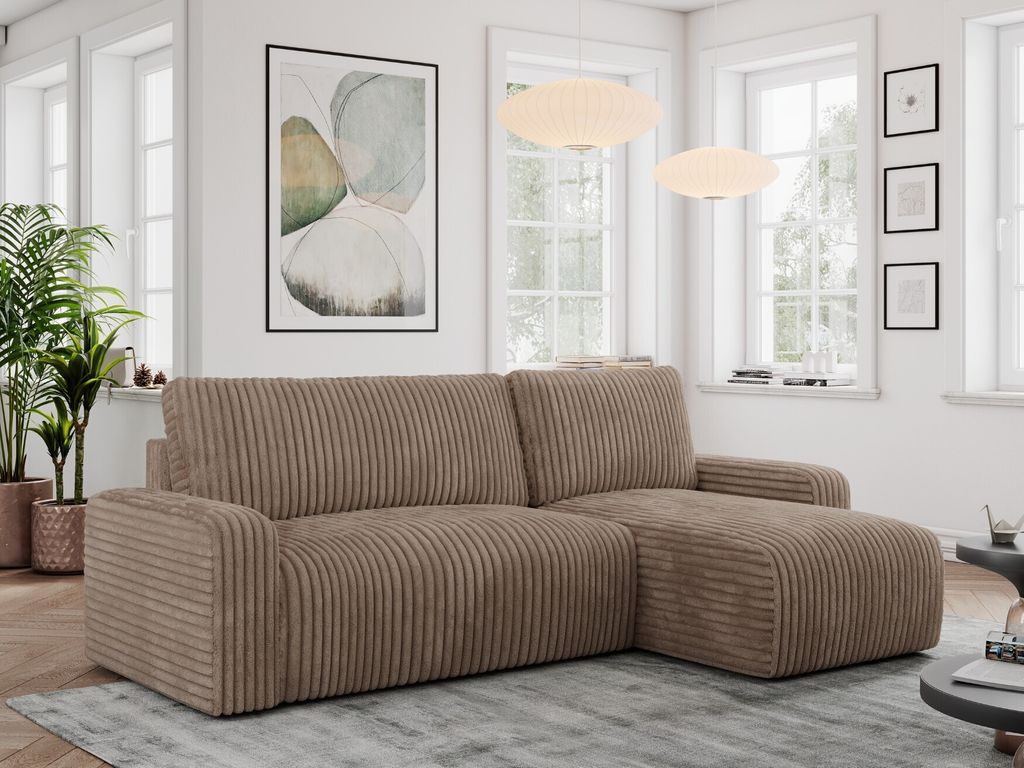 A modern living room with a brown cord sofa and large windows.