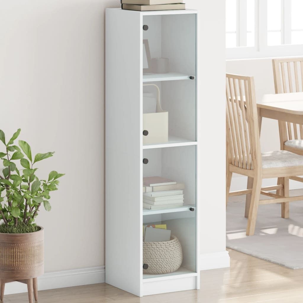 A white highboard with glass doors is shown in a room, next to a dining table and chairs.