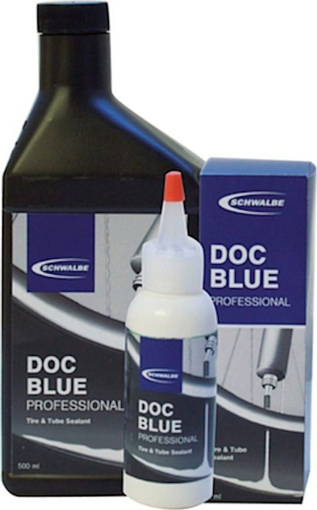 A product shot of Schwalbe Doc Blue Professional tire and tube sealant, showing a large bottle and a smaller applicator bottle.