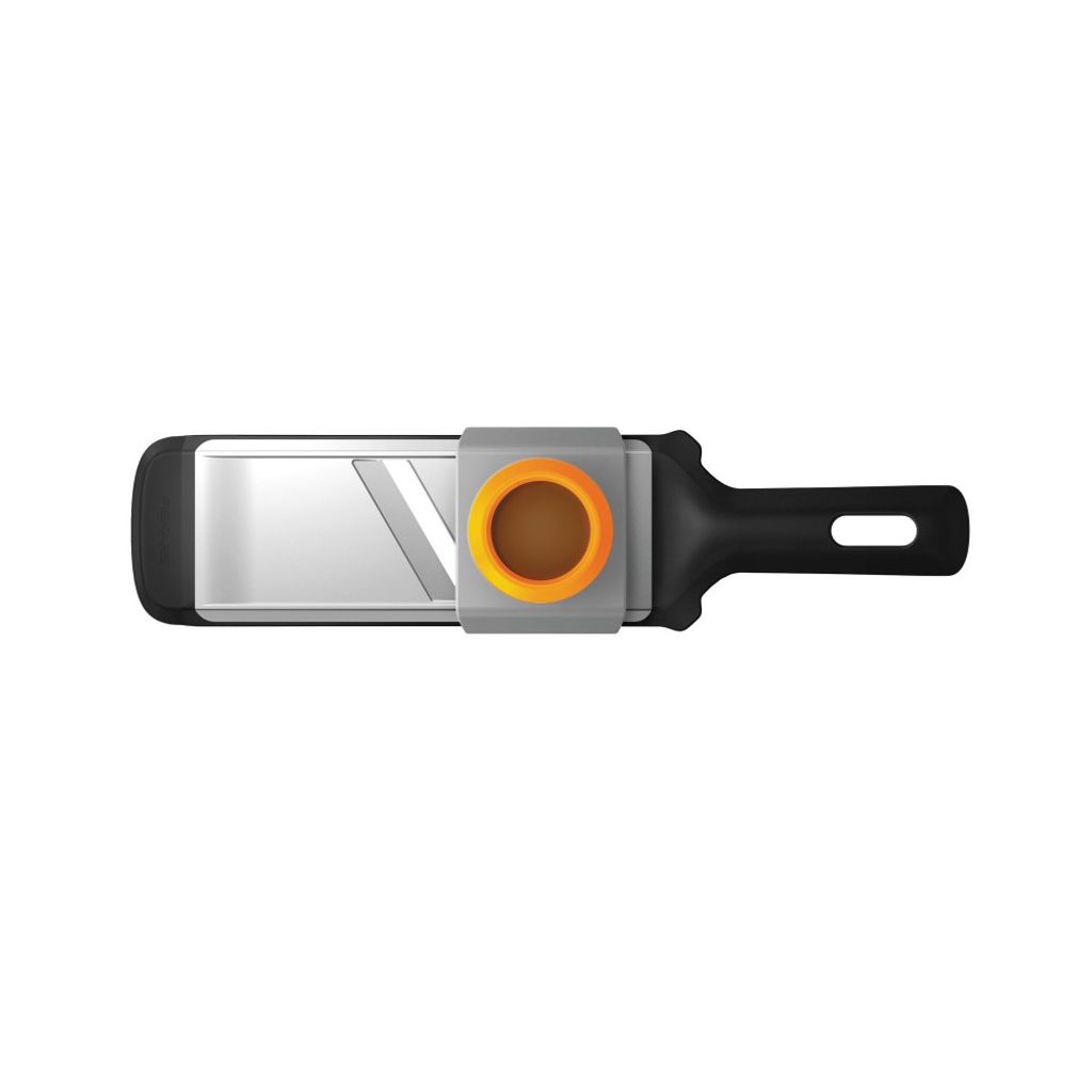 A top-down view of a Fiskars vegetable slicer on a white background.