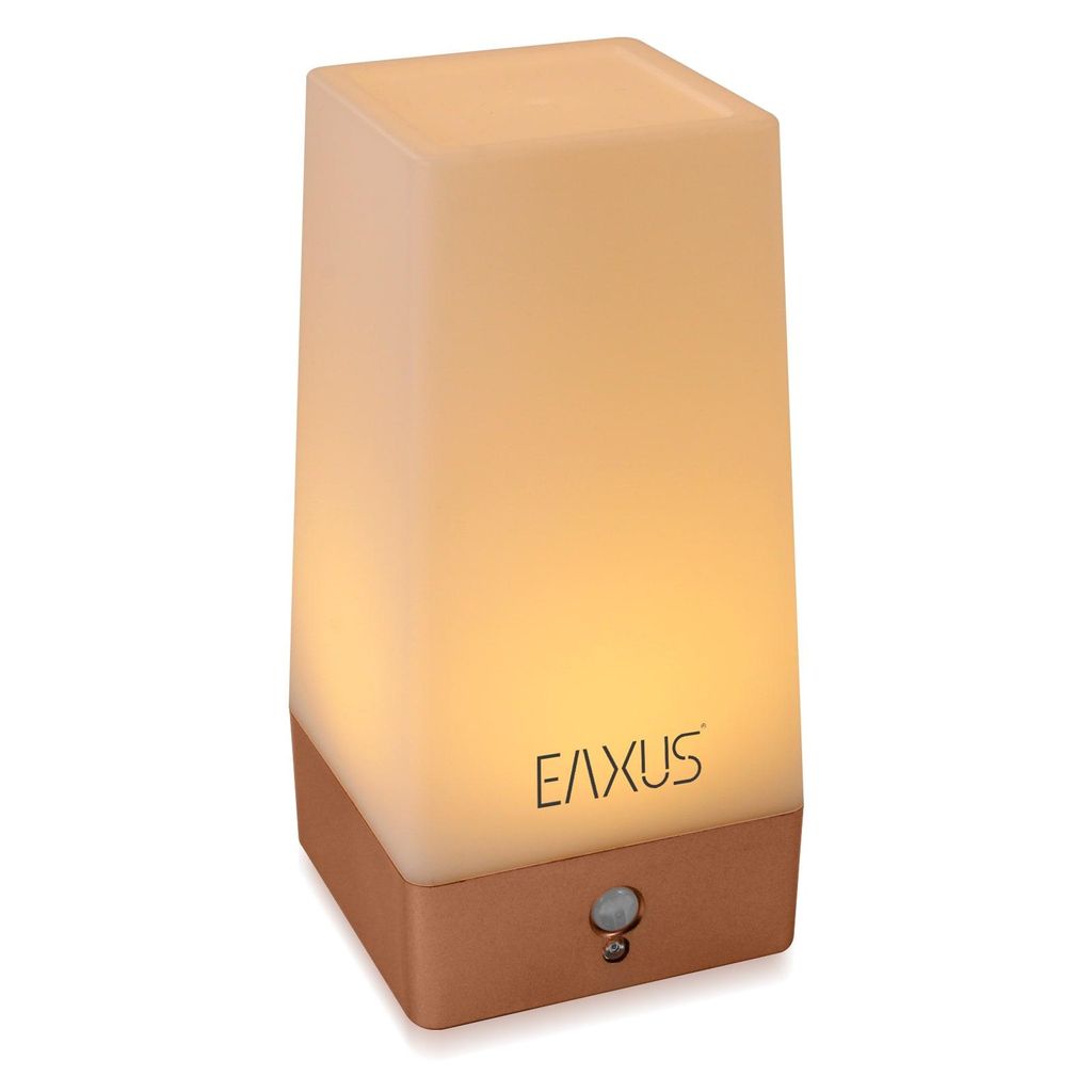 A product shot of a white LED night light with a brown base.