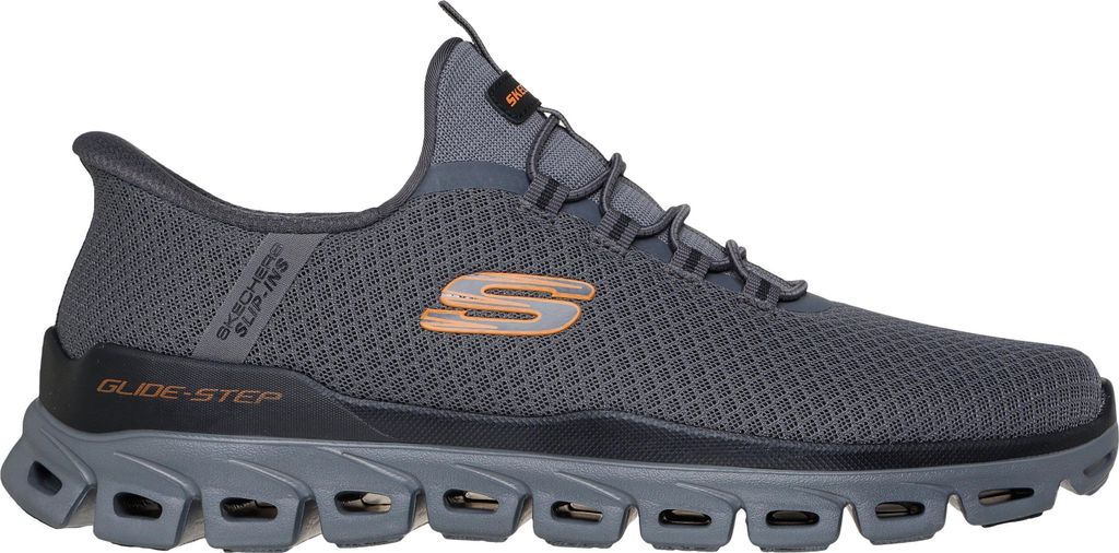 A side view of a single gray Skechers shoe against a white background.