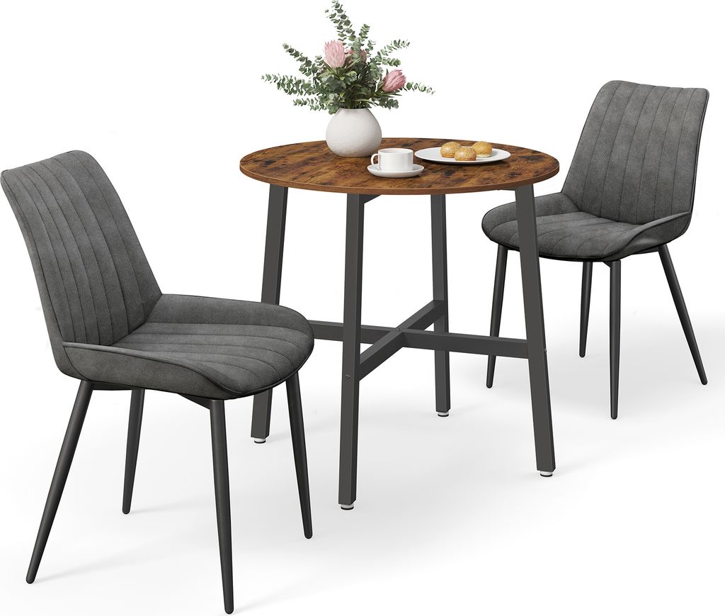 A round dining table with two chairs, set against a white background.