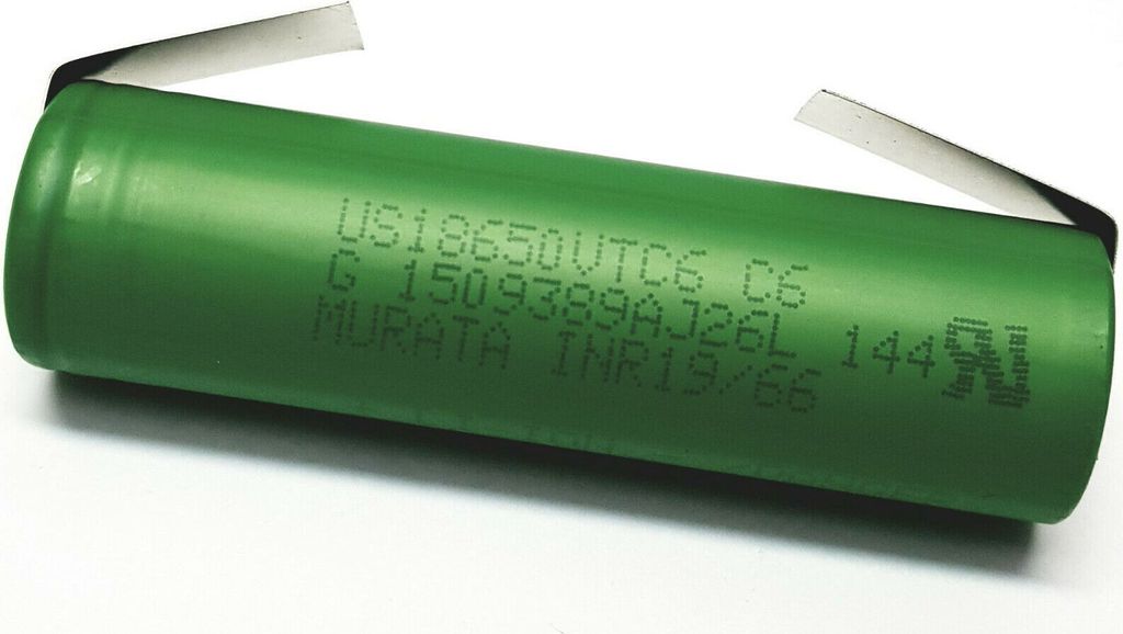 A single green battery with silver tabs is shown on a white background.