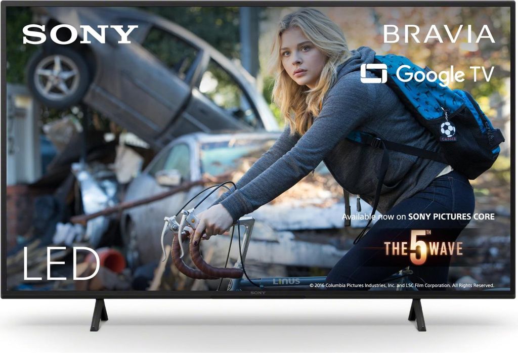 A television screen displaying a movie poster with a young woman on a bicycle in a post-apocalyptic setting.
