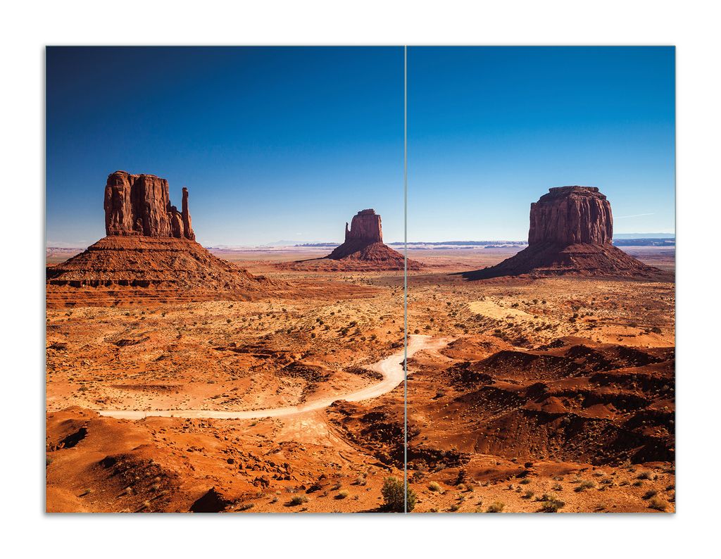 Wallario Herdabdeckplatte aus Glas, Größe 70 x 52 cm 2-teilig, Motiv Monument Valley unter blauem Himmel