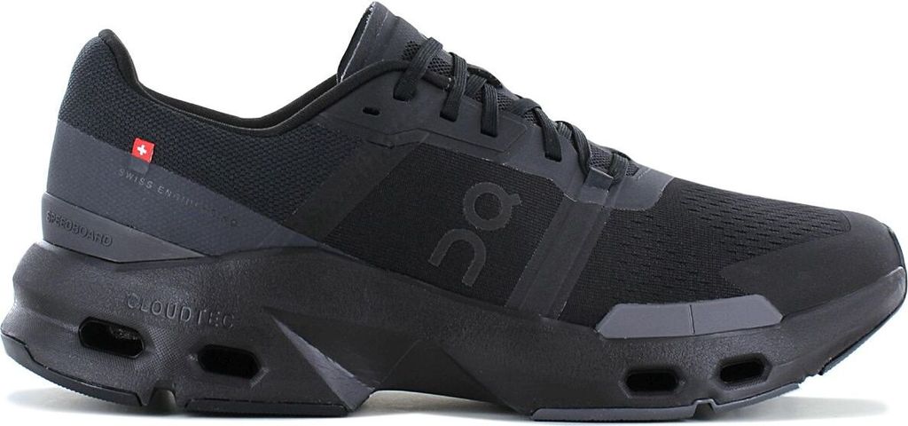 A studio shot of a single black running shoe.