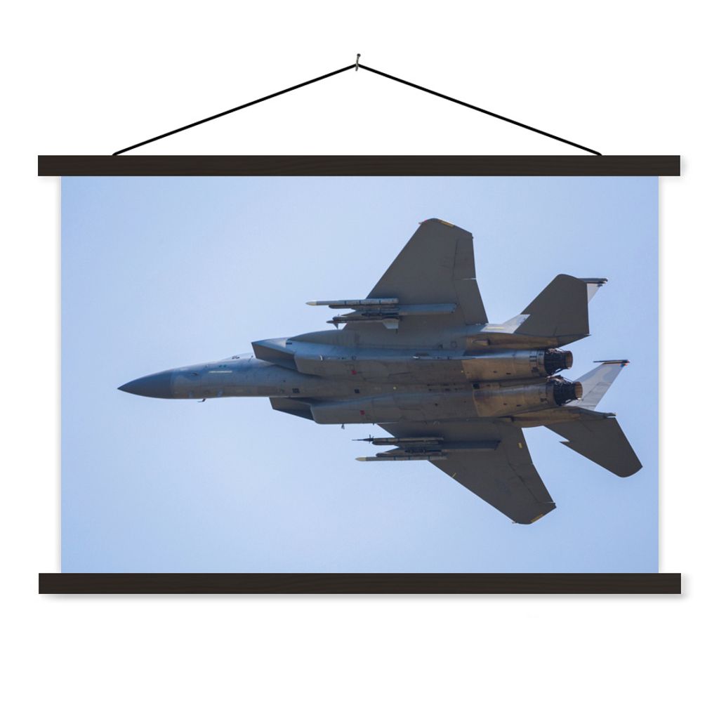 MuchoWow Textilposter Ein weißes Kampfflugzeug am blauen Himmel 150x100 cm mit schwarzem Rahmen - Schlafzimmer