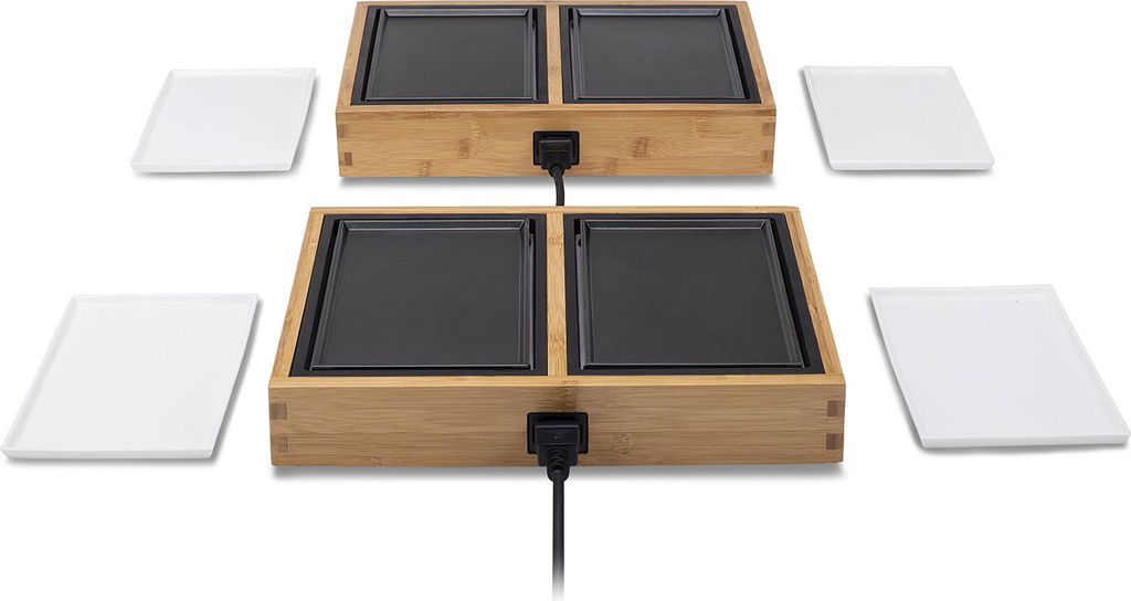 Two tabletop grills with bamboo bases and black cooking surfaces, each with two square cooking plates, are shown. Four white square plates are placed around the grills.