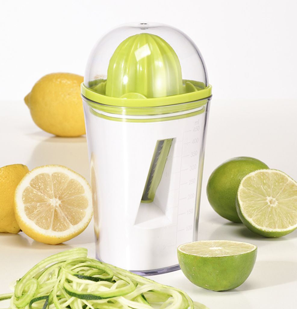 A kitchen tool with lemons and limes, demonstrating its dual function as a juicer and spiralizer.
